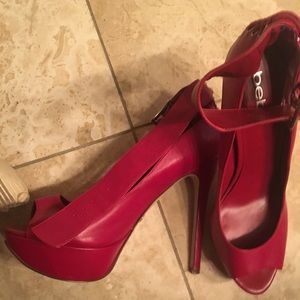 Red BEBE heels